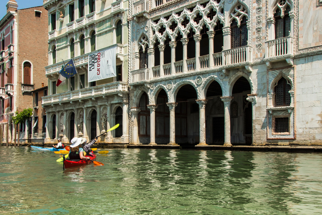 Padders Observe Architectural Detail Along the Canal Grande, Venice